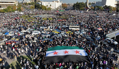 Jubilant Syrians crowd squares for victory rallies